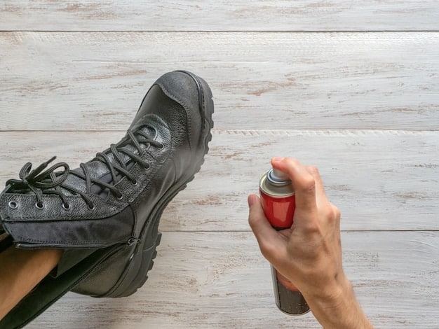 A person carefully decontaminating their hiking boots and gear after exiting a cave, using a spray bottle with disinfectant. They are wearing gloves and a mask for protection.