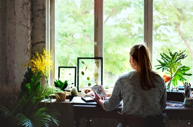 A person working in a minimalist, organized workspace with natural light, surrounded by plants and inspirational artwork.