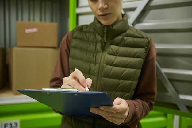 A close-up of a customs officer examining documents related to USMCA compliance, highlighting the importance of accurate and complete paperwork for tariff qualification.