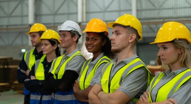 A group of construction workers, wearing hard hats and safety vests, participating in a training session. The instructor is demonstrating a new technology or technique. The atmosphere is collaborative and focused on learning, representing the importance of skills development. Focus on future-proofing and 'Expert Analysis: The Impact of the Infrastructure Bill on Construction Companies'.