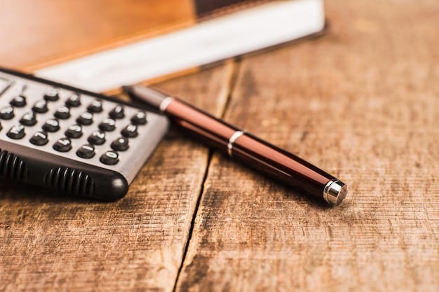 A close-up shot of a calculator with financial documents and a pen, symbolizing year-end tax planning strategies for businesses.