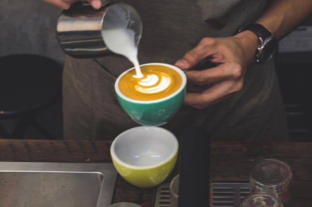 A close-up shot of a barista meticulously preparing a latte with latte art in a modern coffee shop. The focus is on the precision and skill involved in crafting the perfect cup of coffee, highlighting the artistry and dedication behind the beverage.