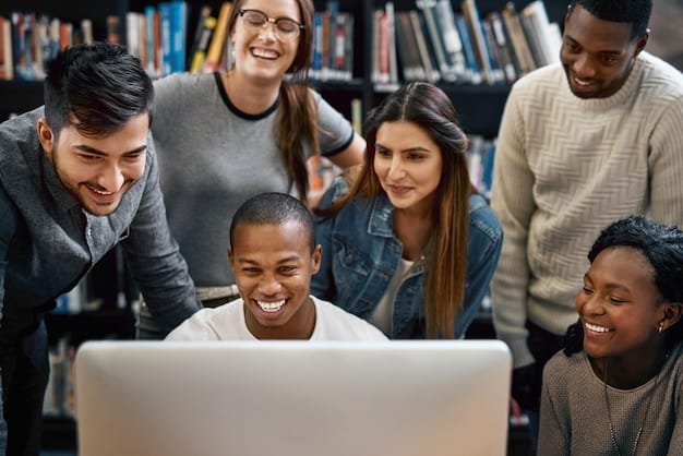A diverse group of people studying together in a modern library, with laptops and books, symbolizing shared educational goals and the impact of student loan policies on various student populations.