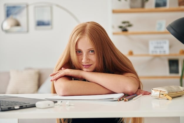 A close-up shot of a young girl sitting at a desk, focusedly studying her books. Her face shows concentration and determination. The background includes a bookshelf filled with various books and academic materials. This captures the importance of planning for future education expenses via unlocking 529 Plans: Maximize Your Education Savings in 2025 with These Insider Strategies.