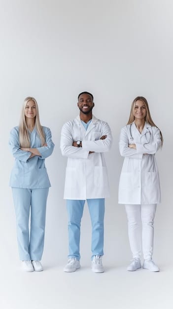 A diverse group of professionals in scrubs, lab coats, and uniforms are smiling and standing together in front of a hospital. This image represents individuals working in public service who might be eligible for loan forgiveness programs related to Understanding Student Loan Forgiveness Programs: Are You Eligible for Up to $20,000 in Relief?.