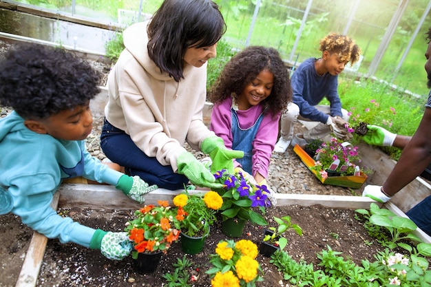 Students volunteering at a local community garden, planting vegetables and flowers. The image conveys a sense of community, collaboration, and environmental responsibility, reflecting the values associated with Beyond the Classroom: 7 Extracurricular Activities That Impress College Admissions Officers.